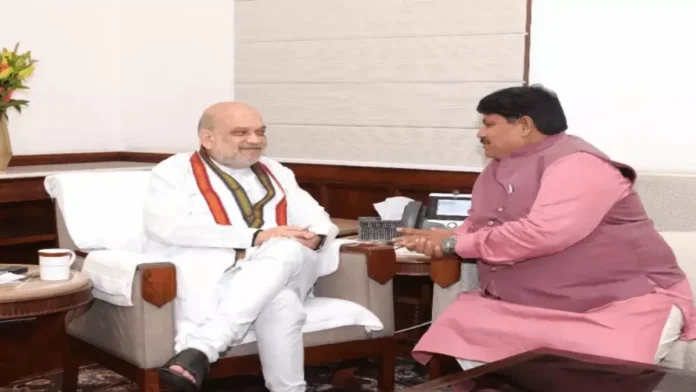 Home_Minister_Amit_Shah_and_Ujjain_MP_Anil_Firojia_1786645045.webp
